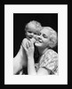 1930s blonde woman mother smiling holding baby to cheek by Anonymous