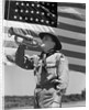1940s boy scout playing bugle in front of 48 star american flag by Anonymous