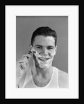 1940s smiling man shaving wearing tee shirt by Anonymous
