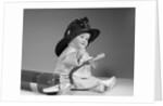 1960s baby fireman with safety hat coat and fire extinguisher by Anonymous