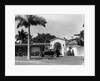 1930s car in circular driveway of tropical stucco spanish style home in sunset islands miami beach florida usa by Anonymous