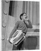 1950s 1960s paperboy selling newspapers shouting extra extra by Anonymous