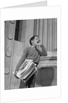 1950s 1960s paperboy selling newspapers shouting extra extra by Anonymous