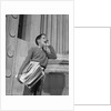 1950s 1960s paperboy selling newspapers shouting extra extra by Anonymous