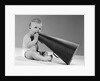 1960s baby in diaper seated holding megaphone by Anonymous