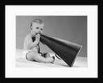 1960s baby in diaper seated holding megaphone by Anonymous