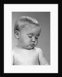 1960s portrait baby nodding off to sleep by Anonymous
