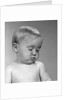 1960s portrait baby nodding off to sleep by Anonymous