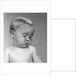 1960s portrait baby nodding off to sleep by Anonymous