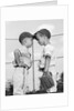 1960s two boys playing baseball arguing by Anonymous