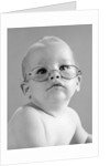 1960s baby wearing wire-rimmed granny glasses by Anonymous