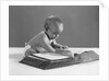 1960s baby wearing glasses looking for a word in big dictionary by Anonymous
