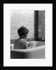 1920s 1930s woman sitting in bath tub by Anonymous