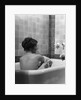 1920s 1930s young brunette woman sitting in luxury bathtub taking a bath by Anonymous