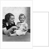 1930s smiling mother and happy child looking at camera by Anonymous