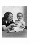 1930s smiling mother and happy child looking at camera by Anonymous