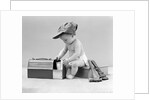 1940s baby in railroad engineer hat pulling milk bottle from lunch pail with hammer & wrench tools at side studio by Anonymous