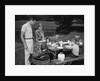 1950s family picnic bar-b-cue mom dad children by Anonymous