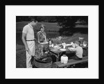 1950s family picnic bar-b-cue mom dad children by Anonymous