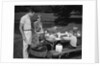1950s family picnic bar-b-cue mom dad children by Anonymous
