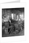 1930s elderly blacksmith with hammer at anvil as young boy holding harness looks on smiling by Anonymous