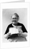 1930s 1940s elderly character woman smiling reading letter wearing apron looking at camera by Anonymous