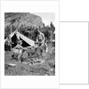 1920s 1930s two men and one woman eating a meal around a campfire with a tent and horses at baker lake alberta canada by Anonymous
