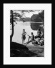 1920s 1930s 3 people picnicking by onata lake man wearing jodhpurs standing two seated women berkshires ma usa by Anonymous