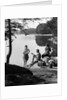 1920s 1930s 3 people picnicking by onata lake man wearing jodhpurs standing two seated women berkshires ma usa by Anonymous
