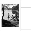 1920s 1930s 3 people picnicking by onata lake man wearing jodhpurs standing two seated women berkshires ma usa by Anonymous