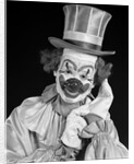 1950s portrait of clown wearing top hat smiling looking at camera by Anonymous