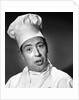 1950s portrait man chef humorous expression looking at camera by Anonymous