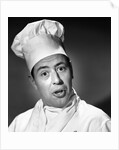 1950s portrait man chef humorous expression looking at camera by Anonymous