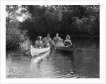 1930s summertime group of five young men & women in two canoes paddling down a stream by Anonymous