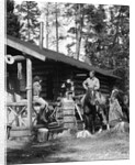 1920s 1930s couple in front of log cabin woman sitting on porch railing man on horse alberta canada by Anonymous