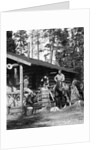 1920s 1930s couple in front of log cabin woman sitting on porch railing man on horse alberta canada by Anonymous