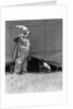 1930s man clown catching little boy peeking under circus big top tent by Anonymous