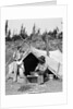 1930s smiling talking couple working by rustic western campsite tent man in cowboy hat smoking pipe washing skillet woman drying dishes by Anonymous