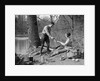1920s 1930s man & woman camping by lake having picnic woman sitting man standing serving food to woman east creek swamp by Anonymous