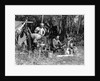 1930s three men at campsite one washing his face at tripod wash stand the other tending campfire lake of the woods ontario canada by Anonymous