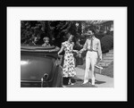 1930s family of four getting into convertible automobile with picnic basket and thermos jug by Anonymous