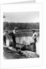 1930s three fishermen standing beside canoe holding fishing gear net backpack lake of the woods ontario by Anonymous