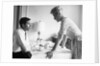 1950s 1960s husband and wife arguing at breakfast table indoor by Anonymous