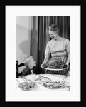 1960s grandmother grandson roast turkey thanksgiving dinner by Anonymous