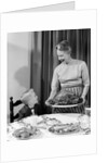 1960s grandmother grandson roast turkey thanksgiving dinner by Anonymous