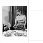 1960s grandmother grandson roast turkey thanksgiving dinner by Anonymous