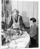 1950s grandmother grandson turkey thanksgiving dinner by Anonymous