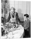 1950s grandmother grandson turkey thanksgiving dinner by Anonymous