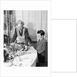1950s grandmother grandson turkey thanksgiving dinner by Anonymous