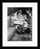 1950s family eating ice cream at a diner by Anonymous